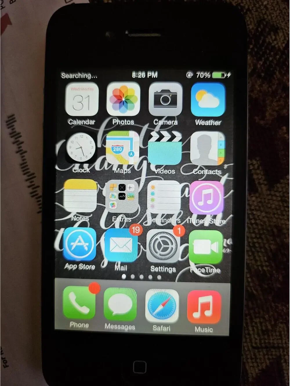 Apple iPhone 4 (i think) - black- charges and powers on. Working. Excellent